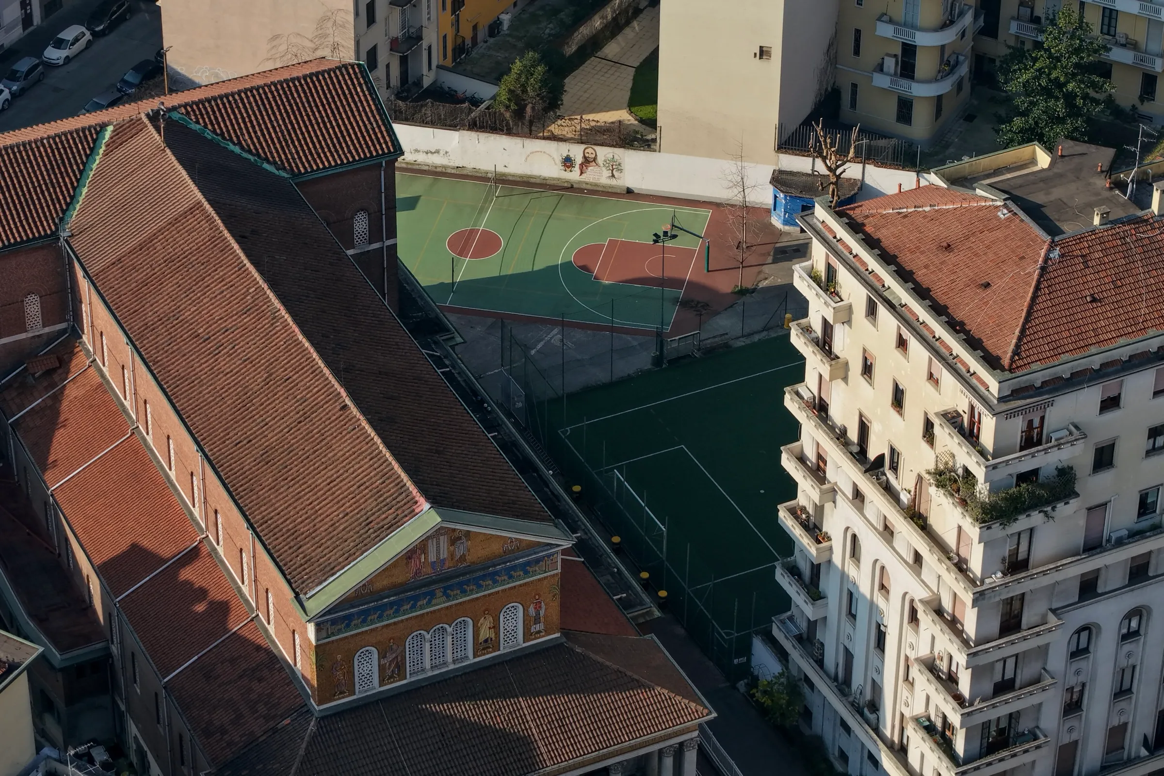 University residence sports grounds with the church in the background